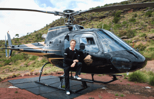 Bernhard Langer standing on a helicopter at Legends Golf and Safari, South Africa